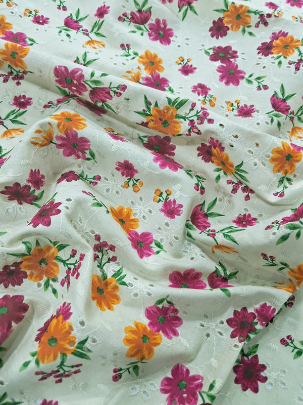 Pink And Yellow Floral Print With White Thread Embroidery On Green Cotton Blended Fabric