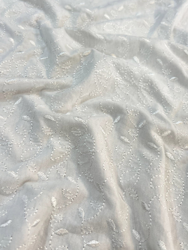 White Thread Geometric Embroidery Adorning Stretchable Cotton Knit Fabric
