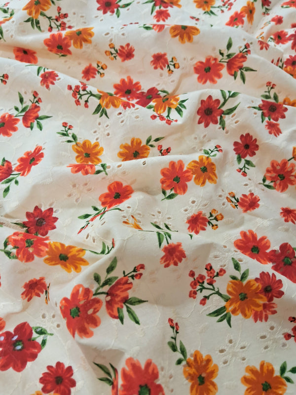 Orange And Yellow Floral Print With White Thread Embroidery On Orange Cotton Blended Fabric