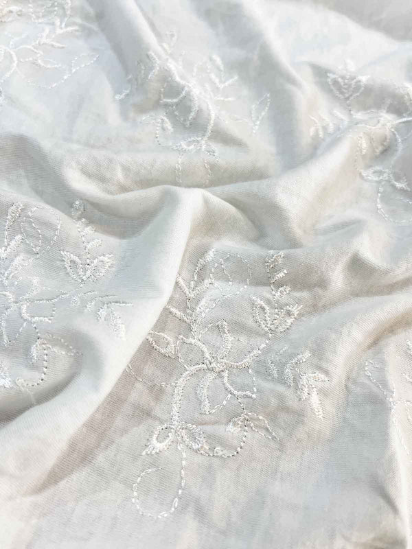 White Thread Adorning Floral Embroidery on Stretchable Cotton Knit Fabric