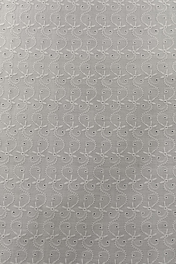 White Schiffli Embroidery on Dyeable PC Fabric.