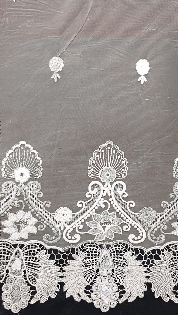 Floral border with all-over butti embroidery on mesh fabric.