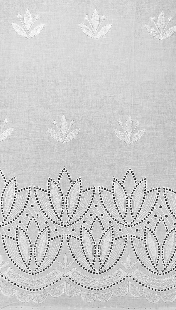 Floral border with all-over butti embroidery on cotton fabric.